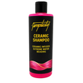 Shampoo bottle with black and pink design on a white background